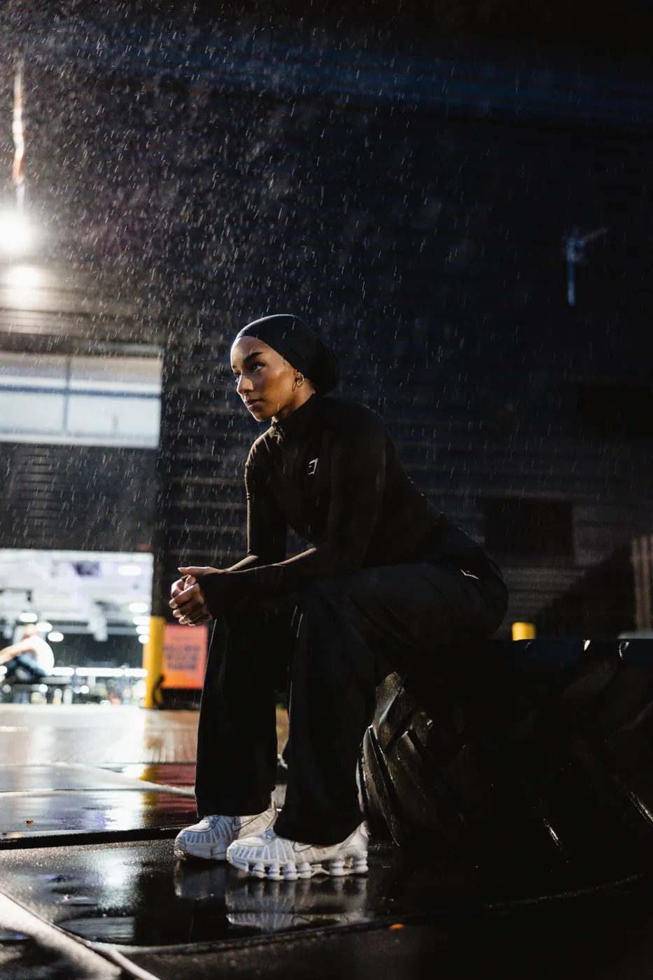 Resting outdoors in the rain between sets